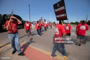 Teamsters union members striking.