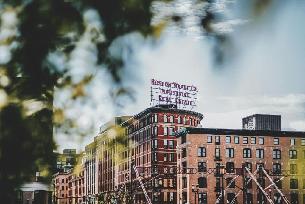 Iconic Boston Wharf Co building showcasing industrial architecture under a clear sky. Boston Marathon Bombing.