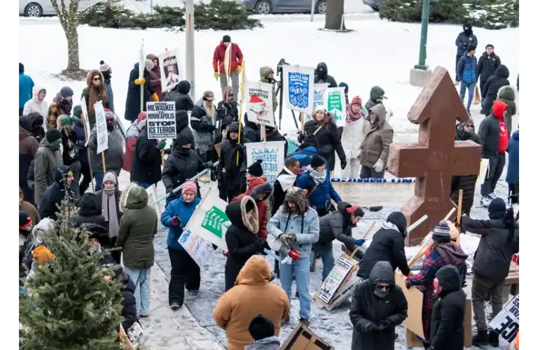 Individuals meet at Red Arrow Park during an emergency protest organized by the Milwaukee branch of the Party for Socialism and Liberation in response to another Minneapolis shooting by federal agents, on Saturday January 24, 2026 in Milwaukee, Wisconsin.