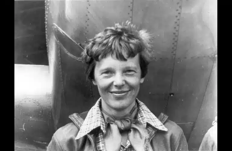 Amelia Earhart Standing Under Her Lockheed Electra