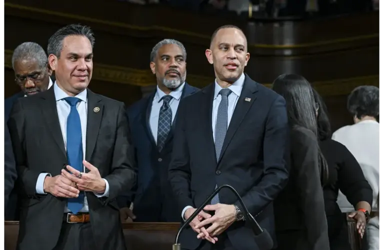 Hakeem Jeffries talking to other politicians