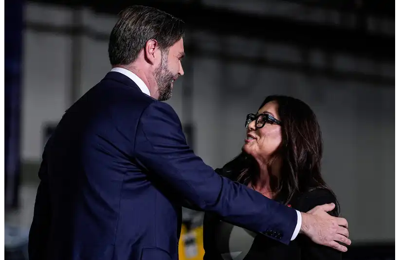 U.S. Secretary of Labor Lori Chavez-DeRemer, right, is embraced by Vice President J.D. Vance. She is reportedly under investigation for misusing taxpayer funds