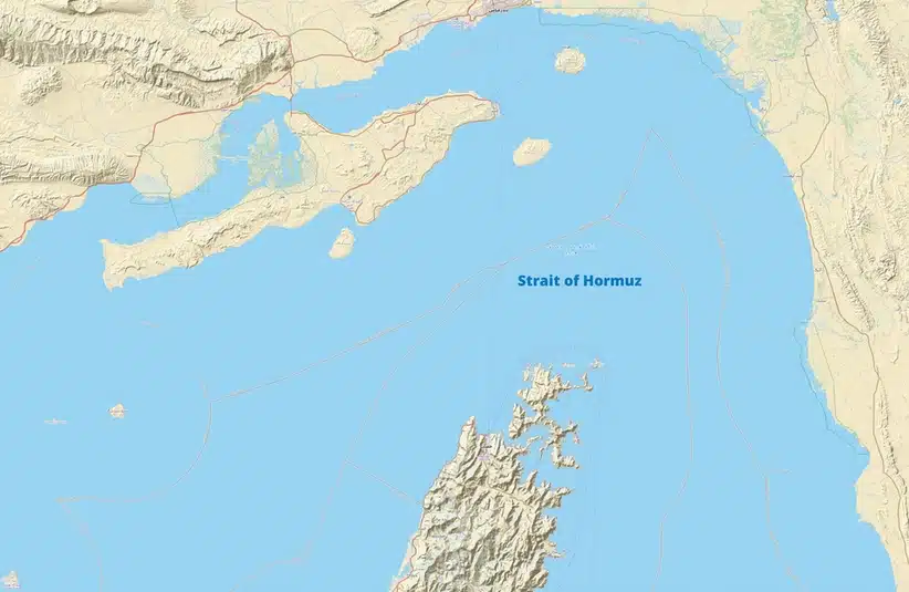 Map of the Strait of Hormuz showing surrounding landmasses and waterways. The terrain is depicted in beige and ocean areas in blue.