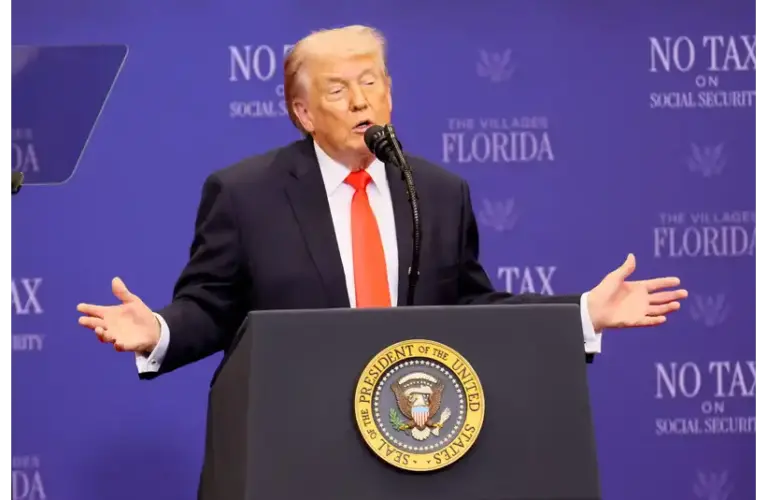 President Trump talking at the podium