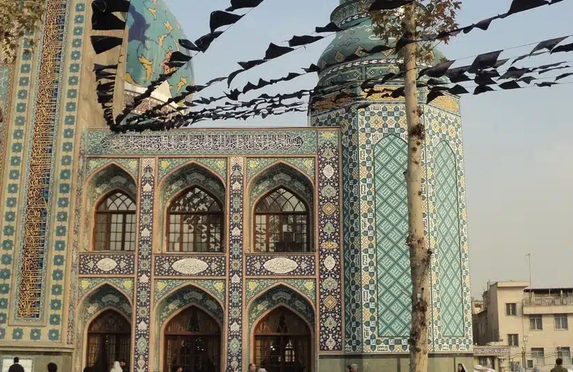 Intricate tilework and architecture of a mosque in Iran