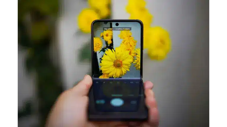a smartphone capturing vivid yellow flowers blends technology and nature beautifully, much like how foldable phones merge innovation with everyday life.