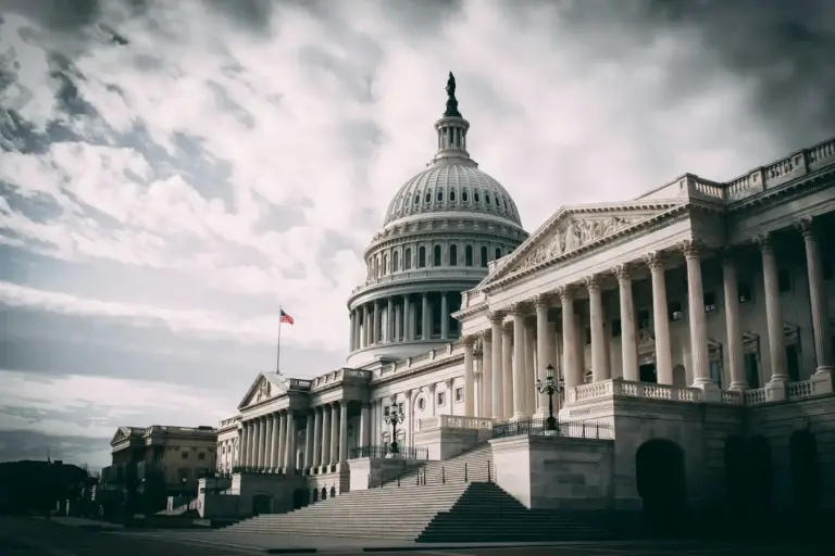 The sunny exterior of the U.S. Capitol dome in Washington, D.C., representing the Senate seats of the late Senator Lindsey Graham and Senator Mitch McConnell.